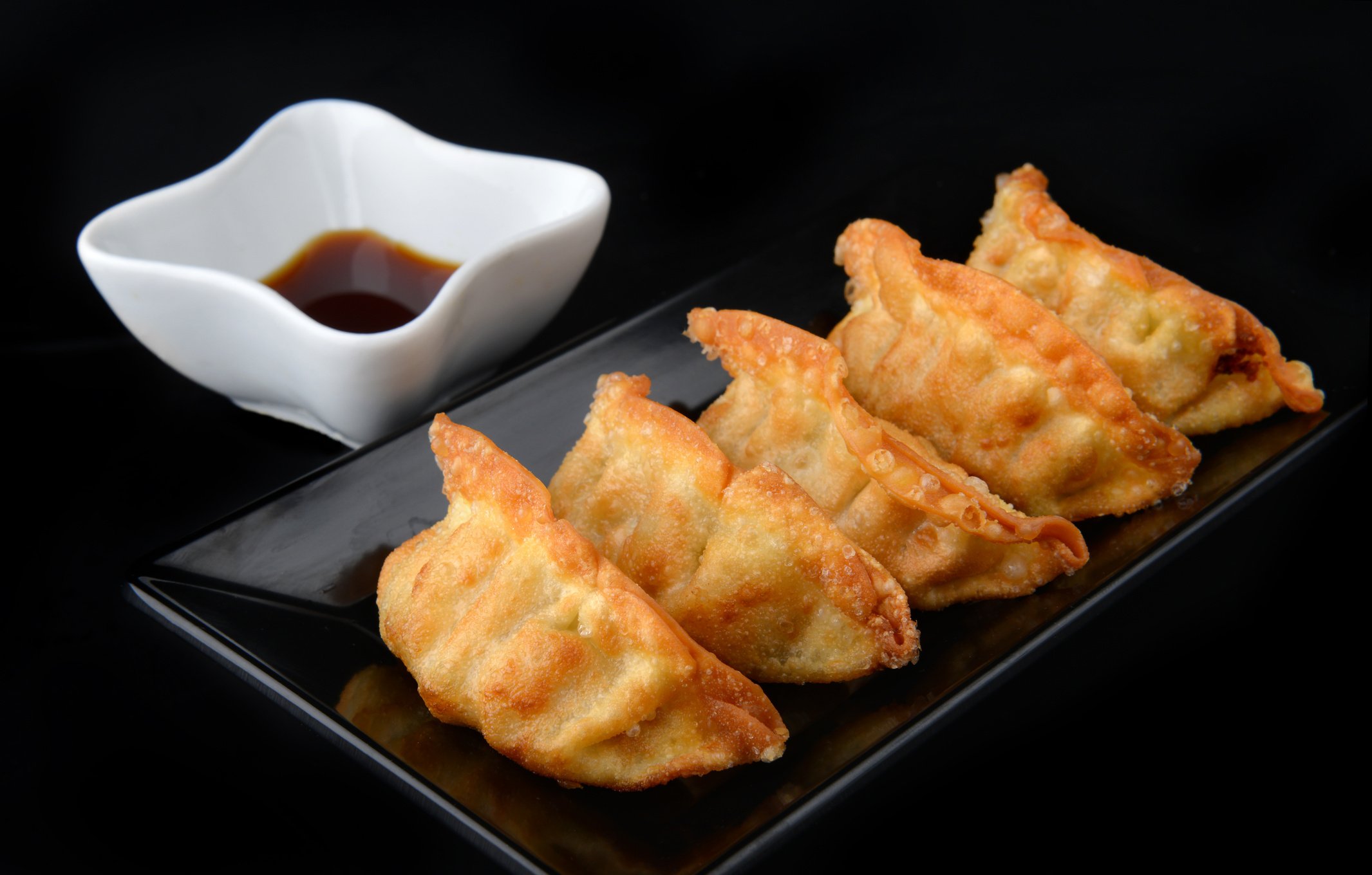 Deep fried gyoza crispy and golden colour.